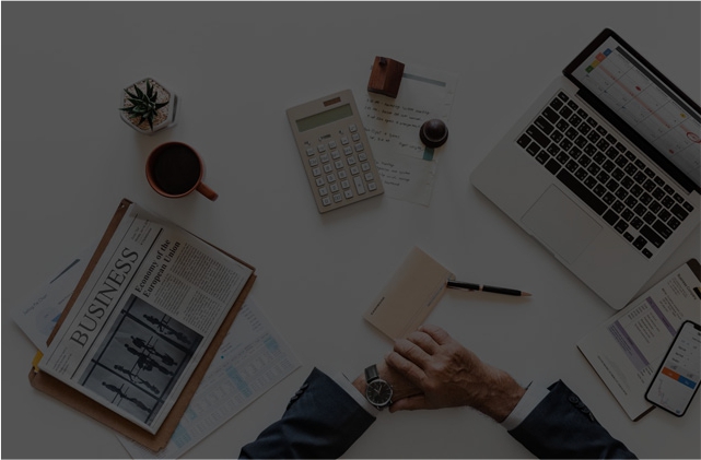 Economic research desk with reports and financial analysis